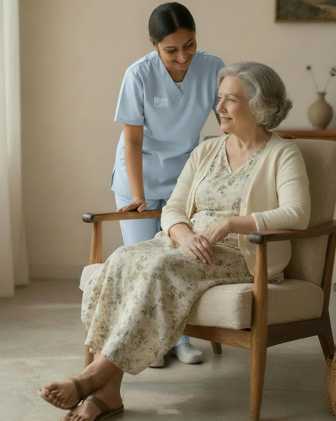 Caregiver gently supporting an elderly woman